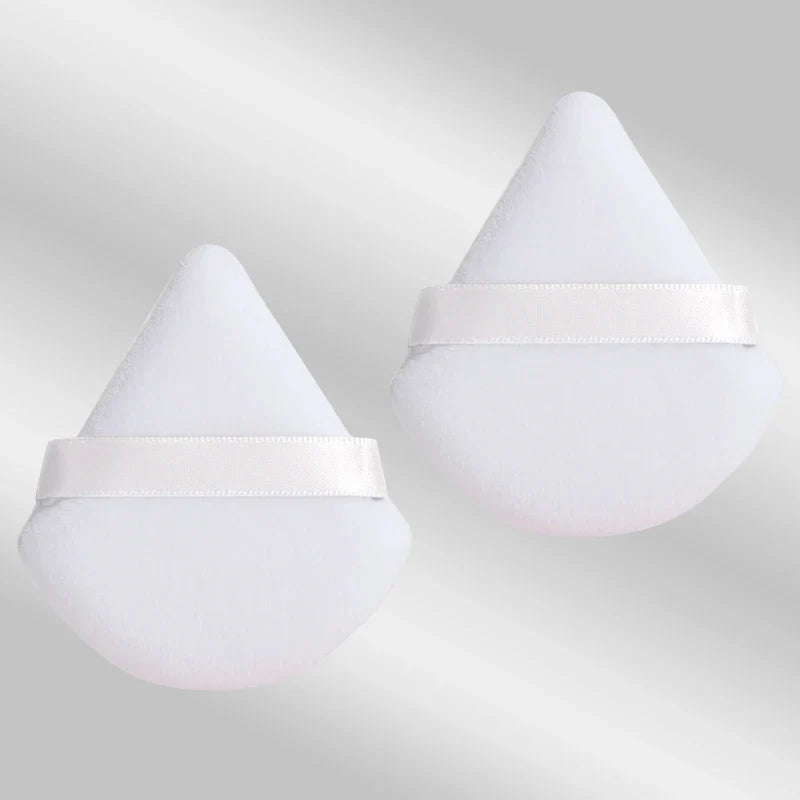 2 velvet triangle puffs for foundation and blending