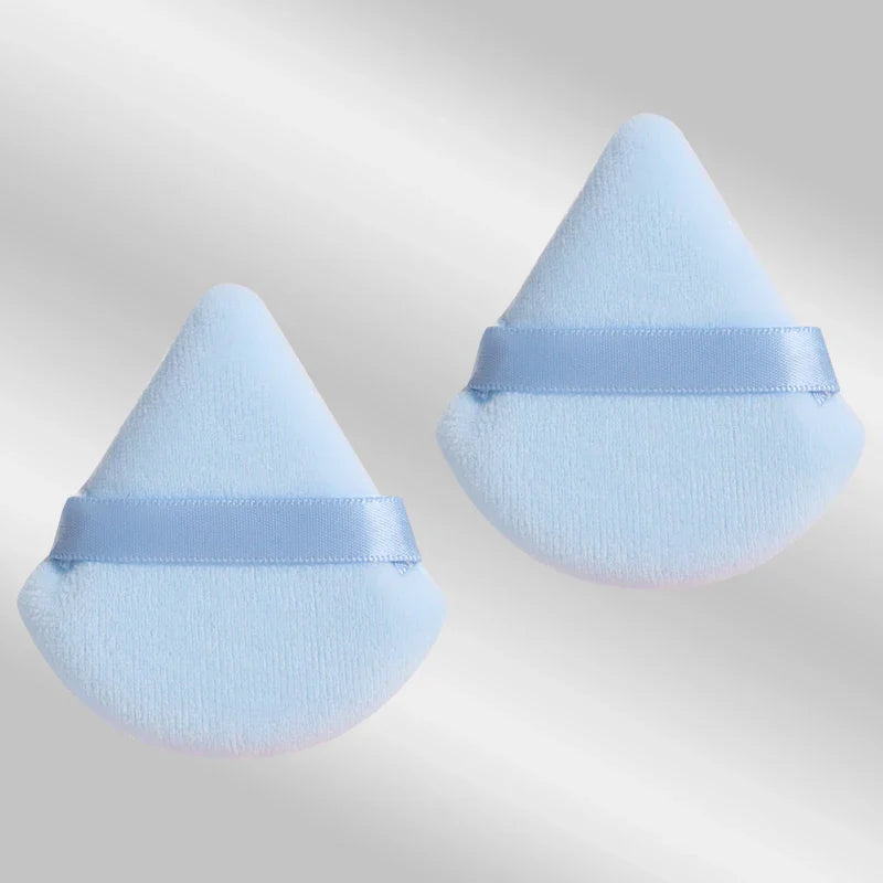2 velvet triangle puffs for foundation and blending
