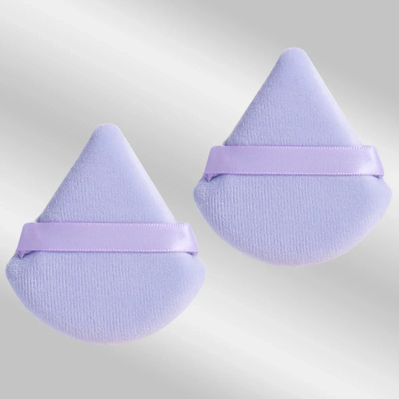 2 velvet triangle puffs for foundation and blending