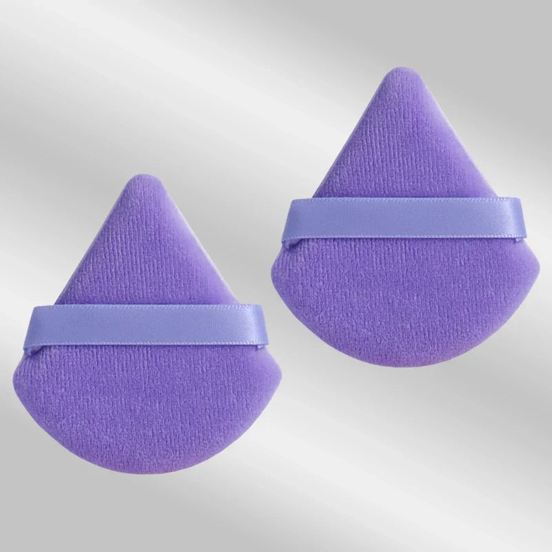 2 velvet triangle puffs for foundation and blending
