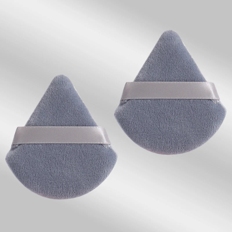 2 velvet triangle puffs for foundation and blending
