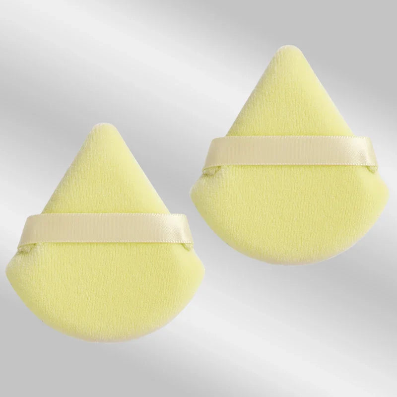 2 velvet triangle puffs for foundation and blending