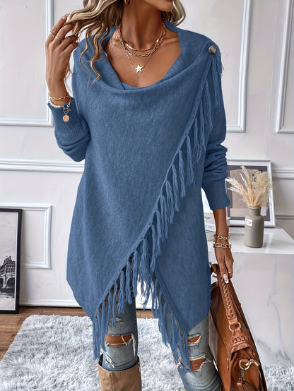 Woman wearing a blue fringe sweater in an indoor setting