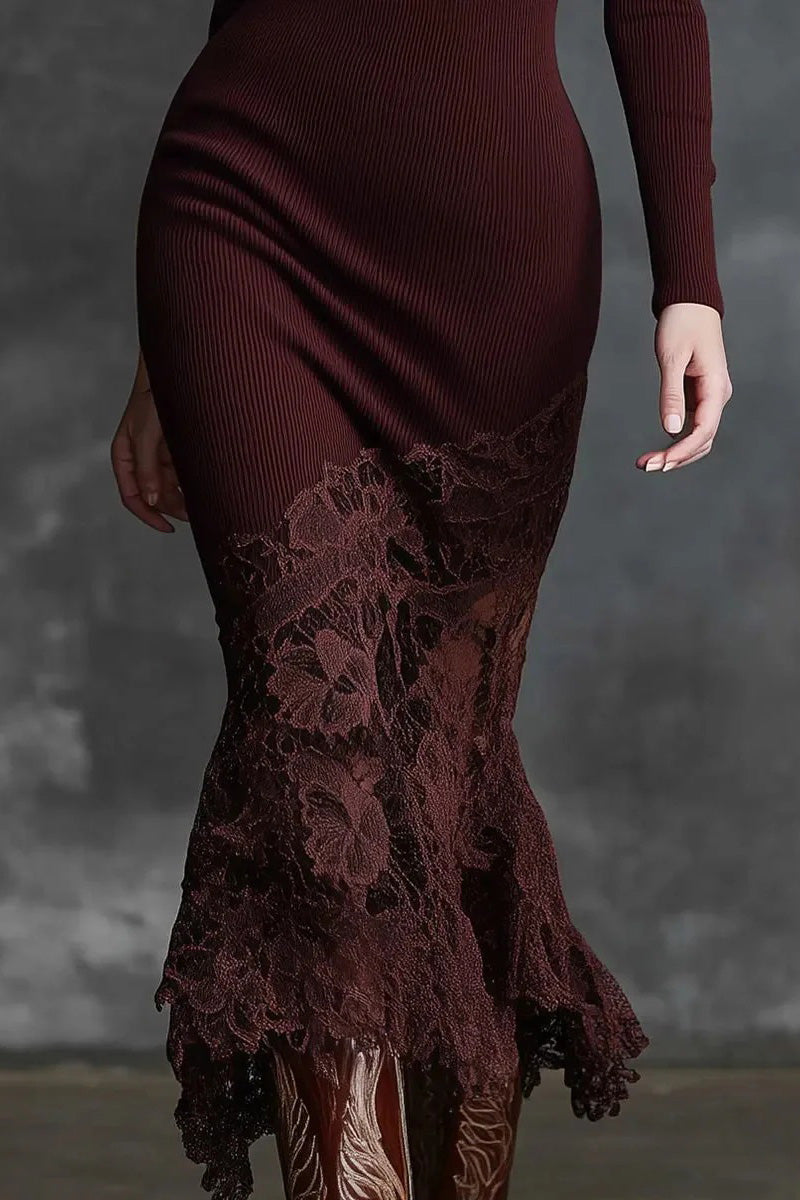 Maroon ribbed dress with lace detailing on a gray background