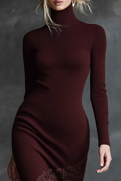 Burgundy ribbed dress worn by a model against a gray background